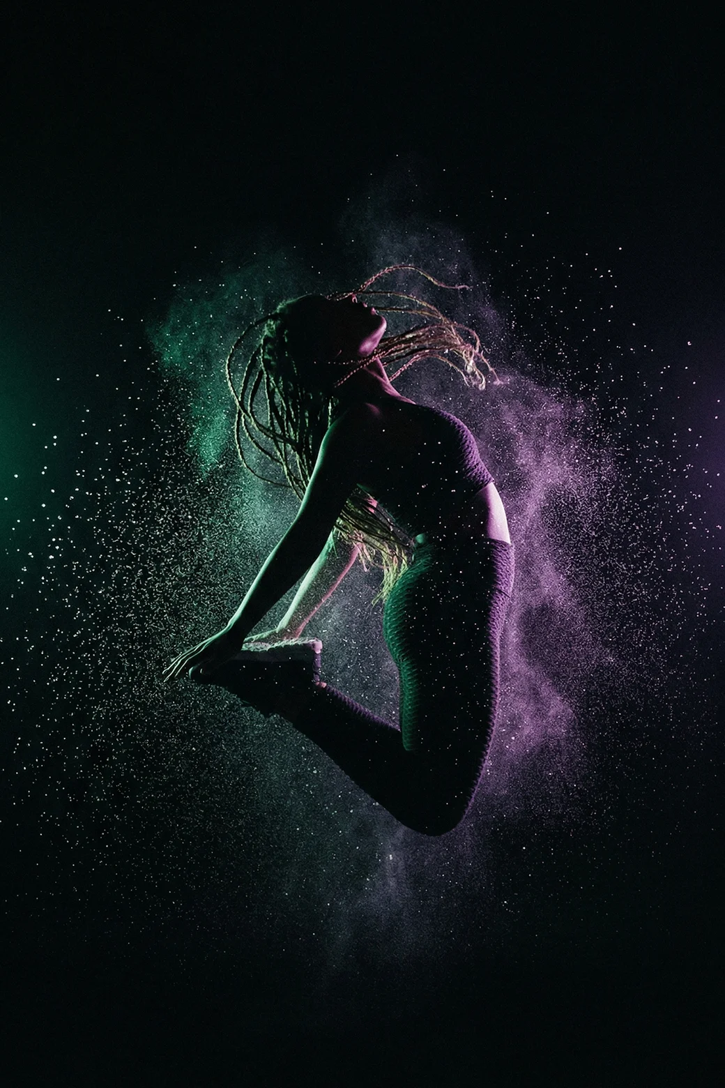 Apex-System-Woman-jumping-dark-void-particle-dust-green-purple